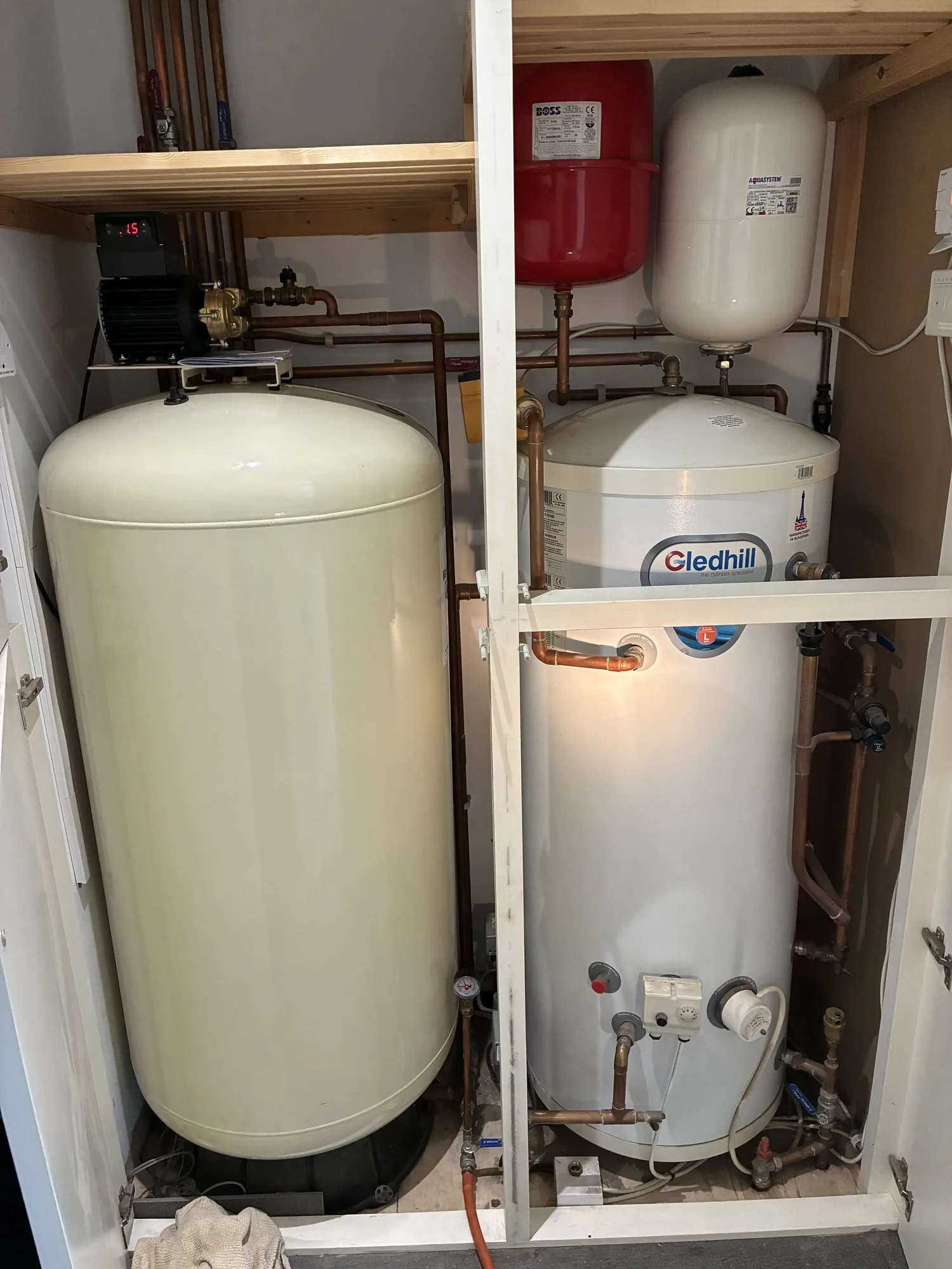Boiler installation pipework run on a clean white wall